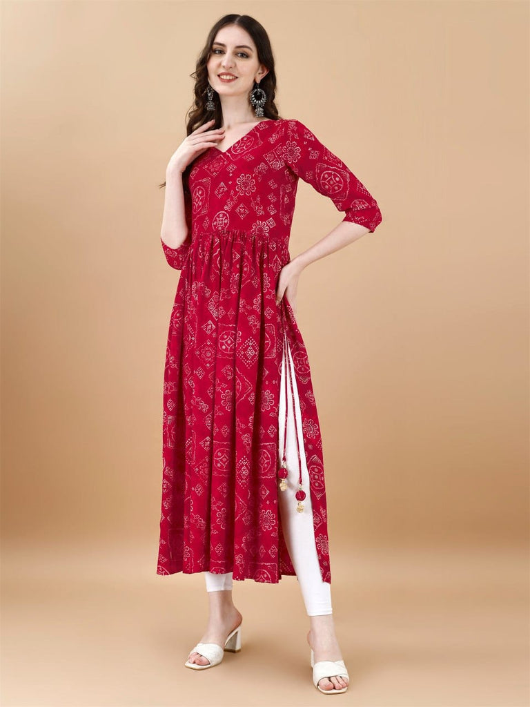 Casual wear rani color bandhani print naira kurti Description